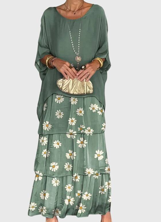 Susan™ elegant long flowing dress by Emma & Rose Cape Town, shown in a graceful, floor-length design with flowing fabric.