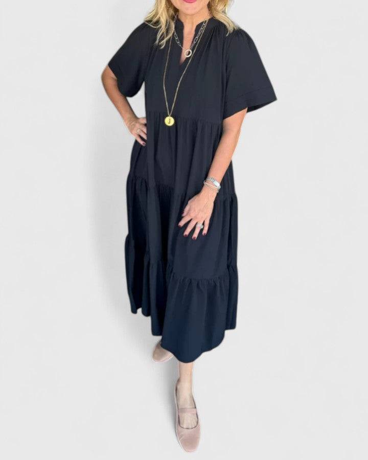 Rebecca™ elegant maxi dress by Emma & Rose Cape Town, flowing fabric with a stylish design and vibrant color.