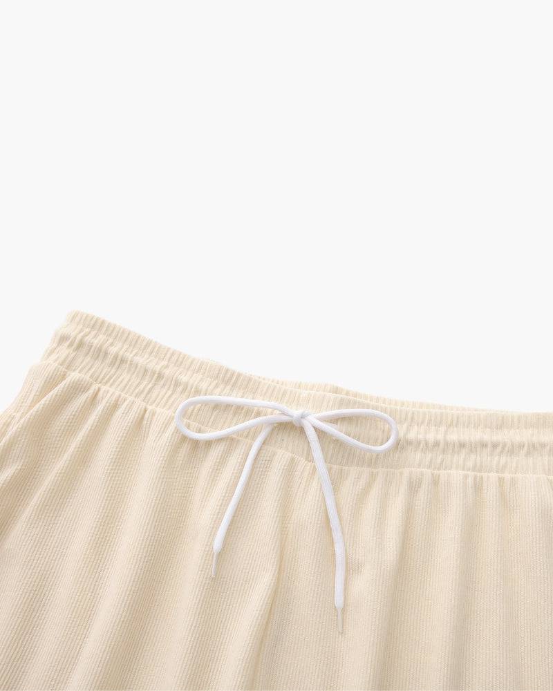 Emma & Rose Manhattan Dean™ Beachstride Shorts in lightweight fabric with a casual fit, shown in vibrant beach-inspired colors.