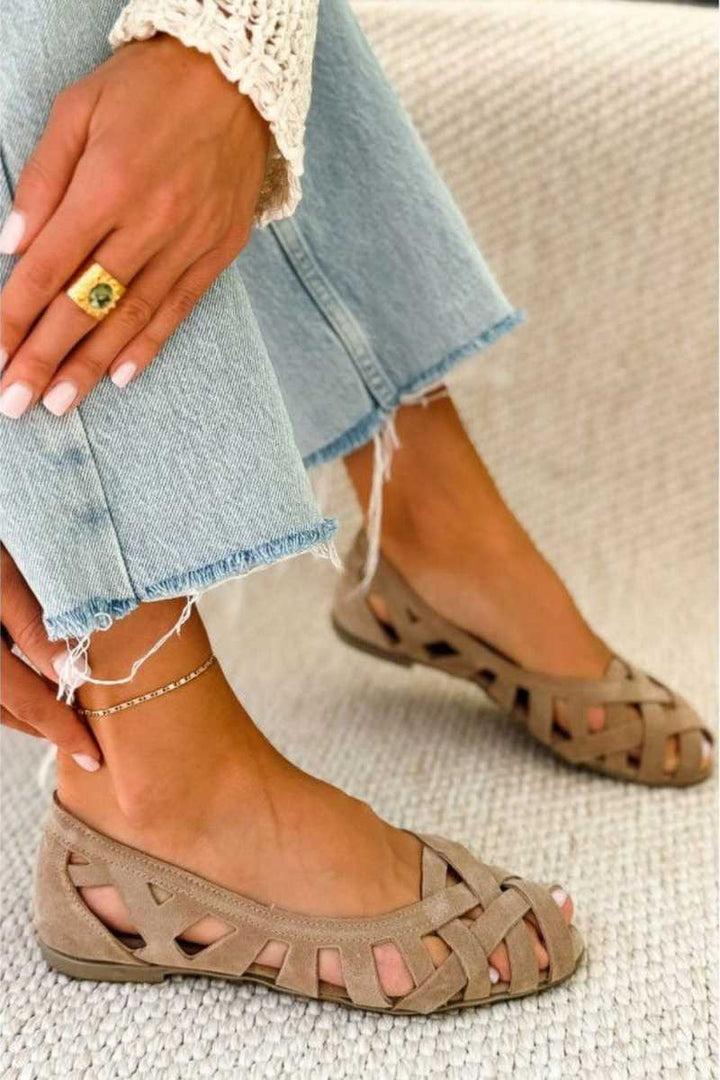 Flat open-toe sandals with woven fabric