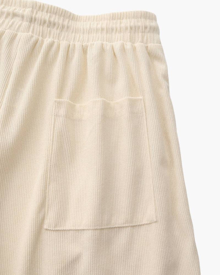 Emma & Rose Manhattan Dean™ Beachstride Shorts in light blue with a relaxed fit and adjustable waistband, perfect for casual beach days.