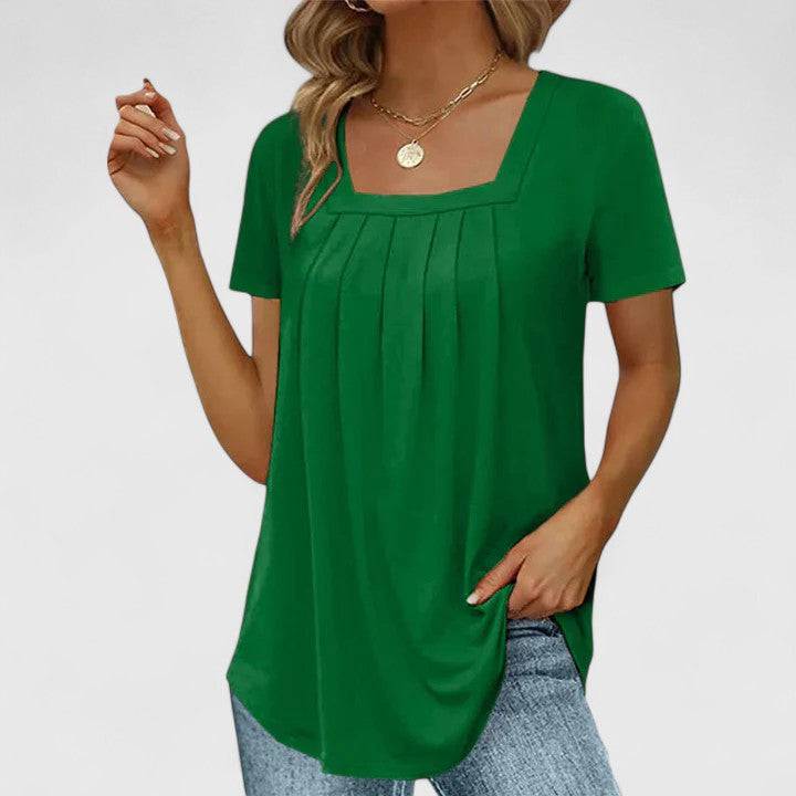 Mirelina™ summer blouse for women by Emma & Rose Cape Town, featuring lightweight, sophisticated design and feminine details.