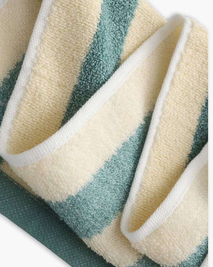 Emma & Rose Manhattan Lance™ Sea Stripe Hand Towel with blue and white nautical pattern, soft cotton fabric, fold displayed.