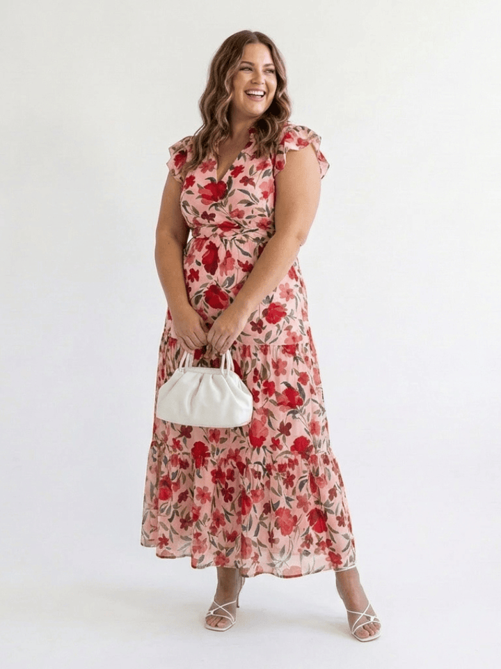 Lila™ V-neck tiered midi dress by Emma & Rose Cape Town, featuring flowing fabric and tiered layers in a stylish design.