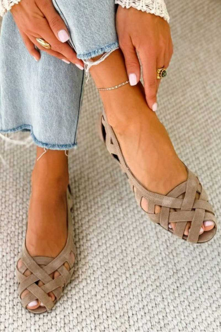Flat open-toe sandals with woven fabric