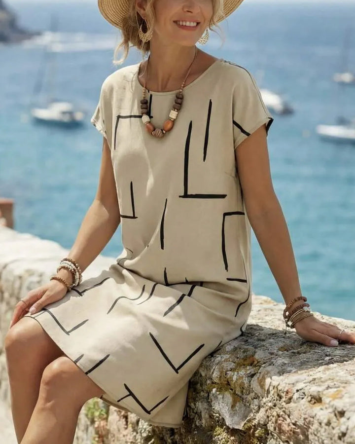 Soline™ | Tummy Concealing Dress with Line Print