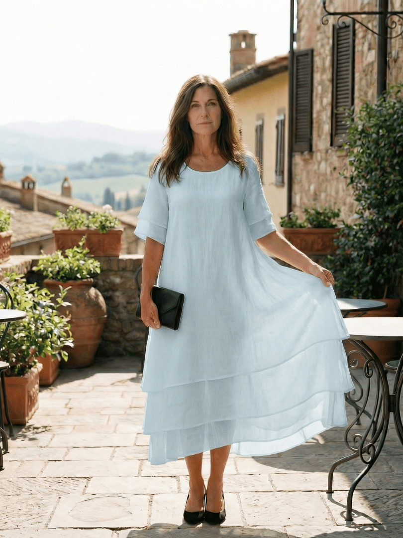 Soft layered dress by Emma & Rose Cape Town featuring flowing fabric and elegant design, perfect for casual or formal wear.