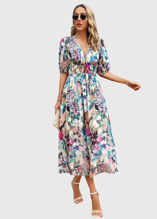 Emma & Rose Cape Town Merlin™ floral midi dress, Estella #1002, showing the flattering silhouette and vibrant floral pattern.