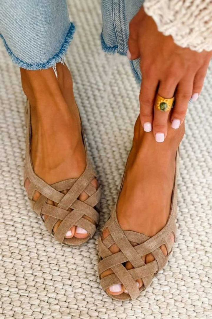Flat open-toe sandals with woven fabric