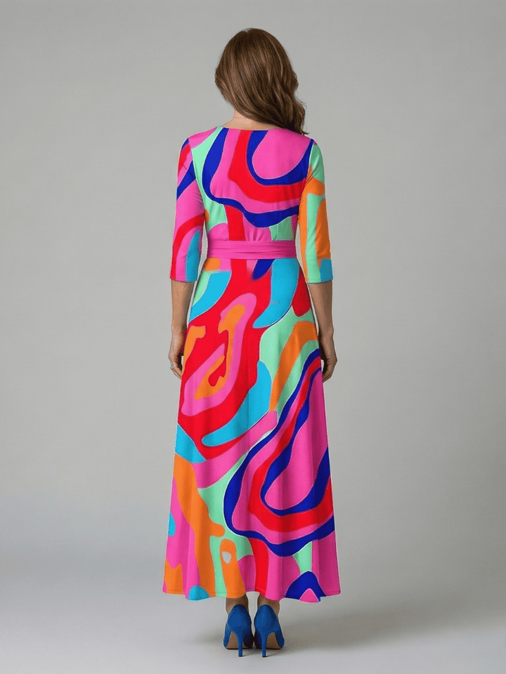 Celine™ wrap neck midi dress by Emma & Rose Cape Town, shown in a stylish design with a flowing silhouette and elegant wrap neckline.