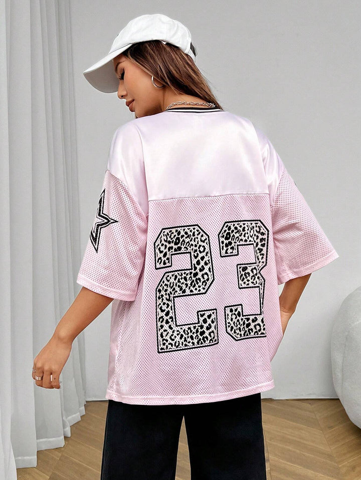 Ayla | Women's oversized mesh jersey shirt with V-neck and animal print