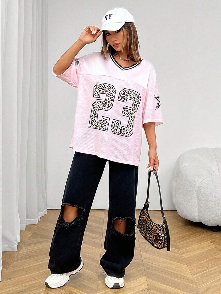 Ayla | Women's oversized mesh jersey shirt with V-neck and animal print