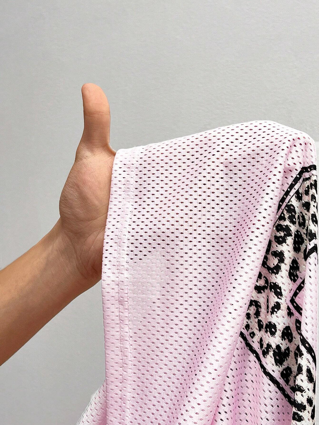 Ayla | Women's oversized mesh jersey shirt with V-neck and animal print
