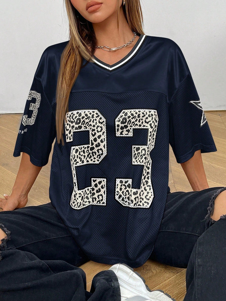 Ayla | Women's oversized mesh jersey shirt with V-neck and animal print