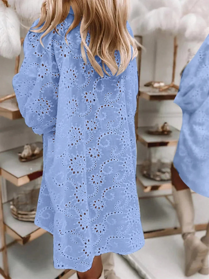 Elegant summer blouse with embroidery and button closure