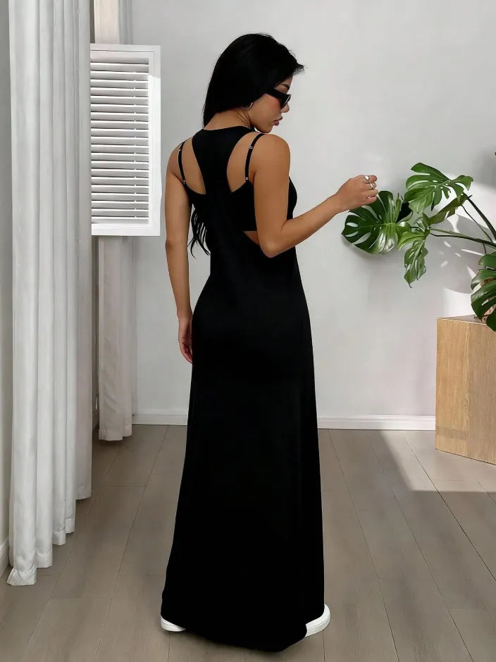 Long women's dress with a two-piece effect and side cutouts
