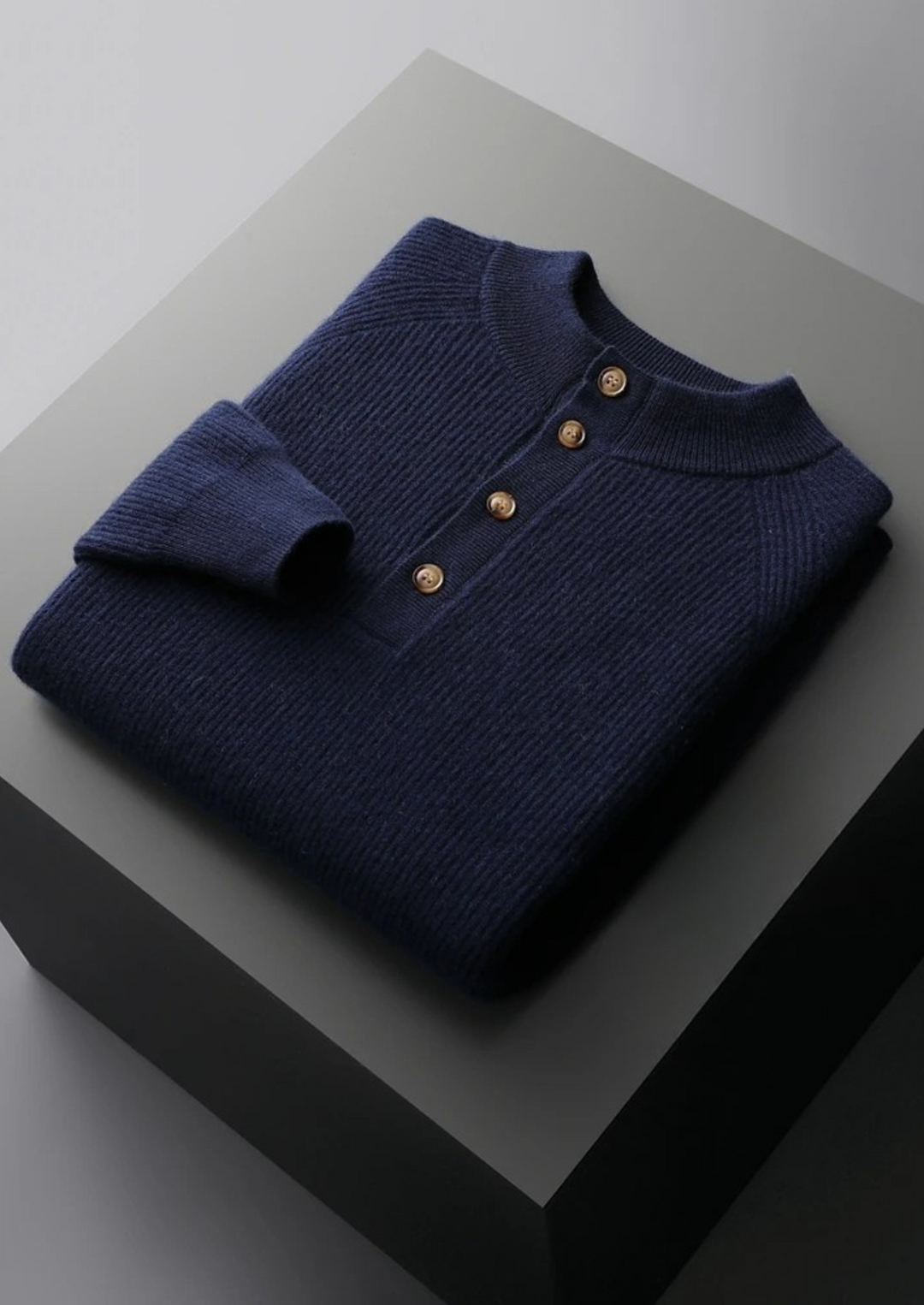 100% CASHMERE BUTTON SWEATER.