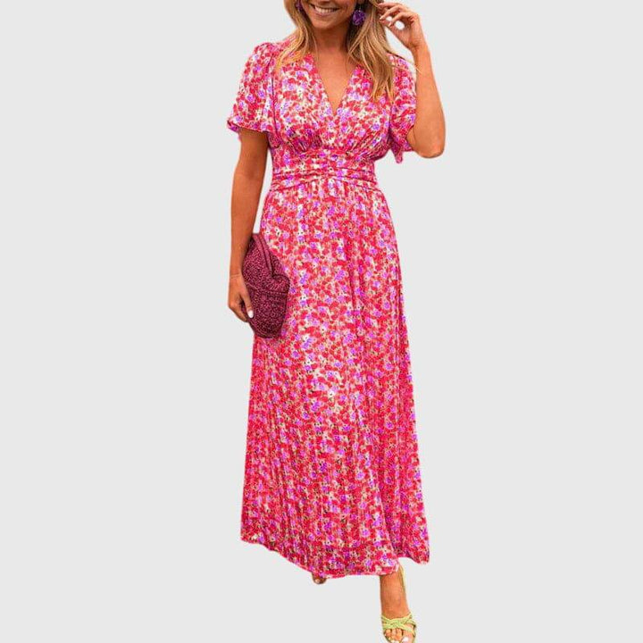 Emma & Rose Cape Town Alice™ comfortable summer dress, light fabric, sleeveless design, and floral pattern perfect for warm weather.
