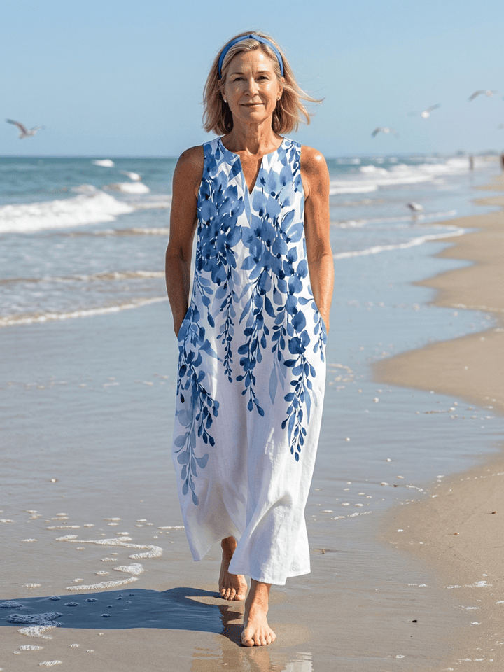 Emma & Rose Cape Town Azura™ Chill Breeze Maxi Dress with flowing fabric and floral pattern, full-length view in natural light.
