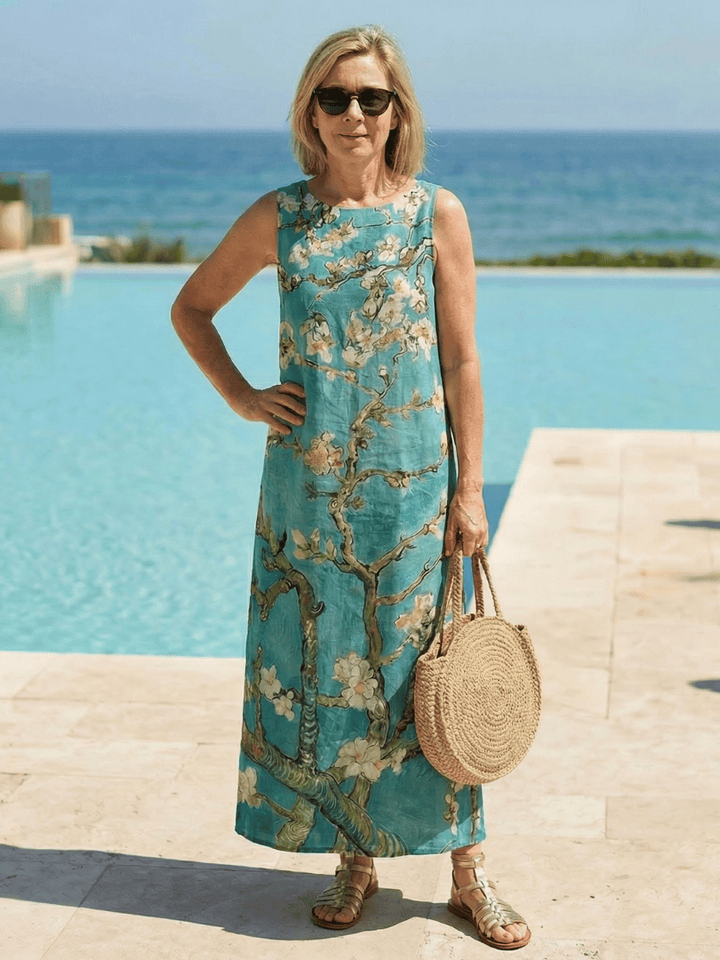 Emma & Rose Cape Town Calistae™ Soft Line Midi Dress in light fabric, featuring a flowing silhouette and elegant design.