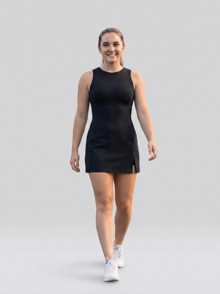 Fayen™ side slit tennis dress by Emma & Rose Cape Town, lightweight athletic dress with a fitted bodice and side slit detail.