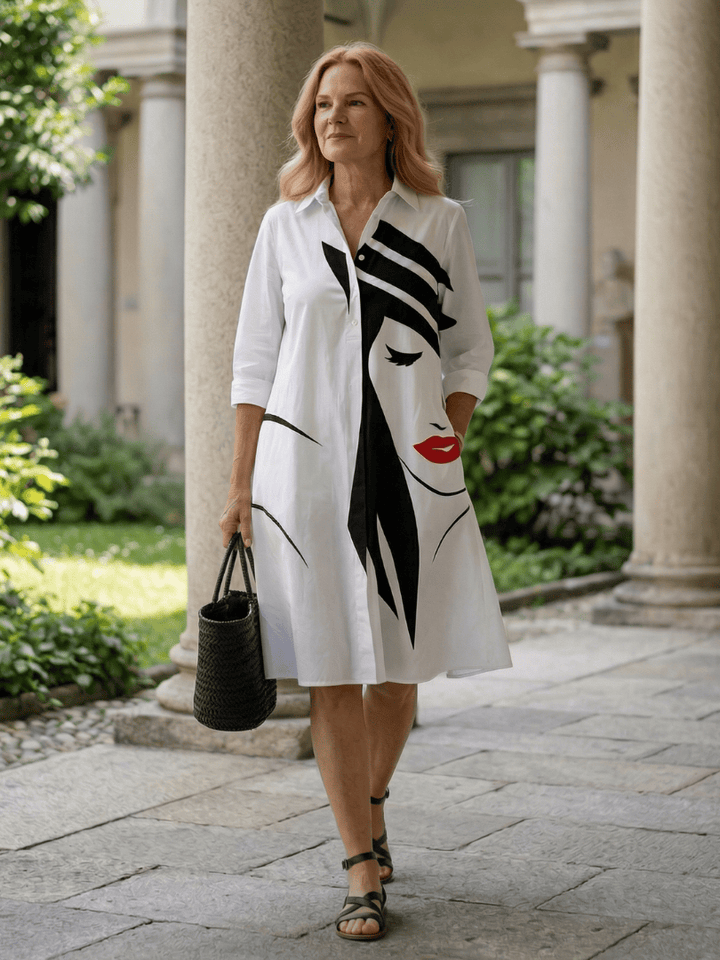 Hannelore™ Day Town Dress by Emma & Rose Cape Town, lightweight floral dress with ruffled sleeves and breezy silhouette.