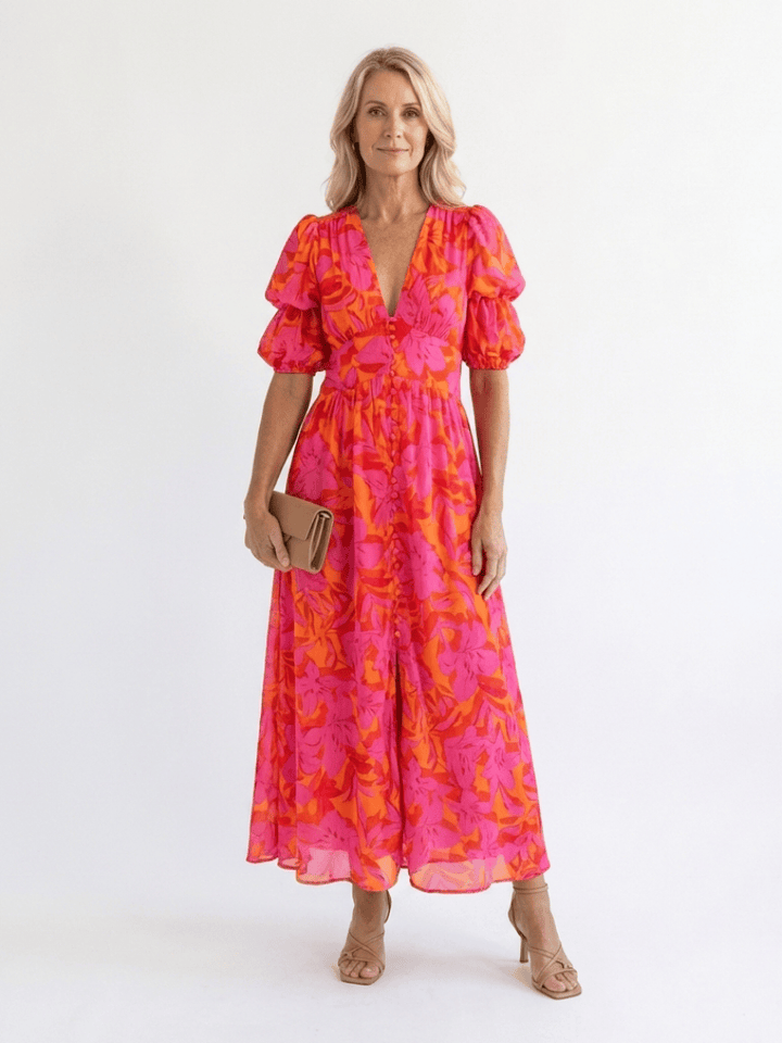 Willow™ puff sleeve midi dress by Emma & Rose Cape Town, featuring a flowing silhouette and stylish puff sleeves.