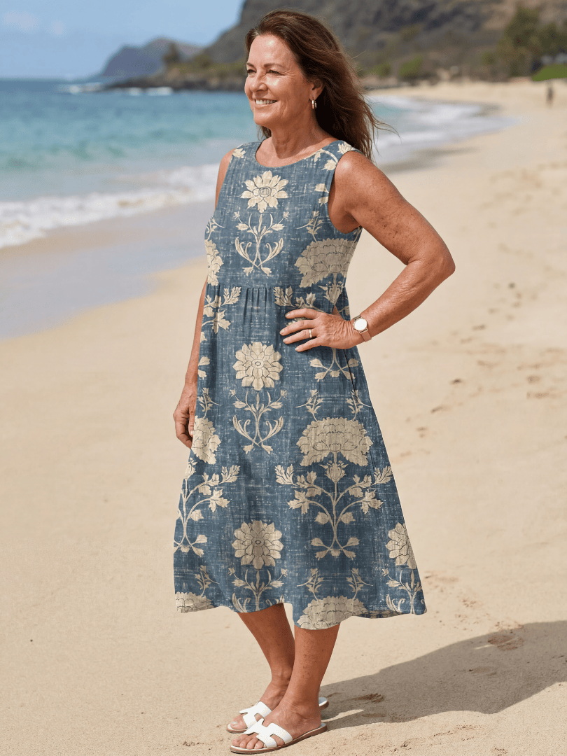 Emma & Rose Cape Town Kailo™ Shoreline Floral Midi Dress featuring a vibrant floral pattern and flowing silhouette.