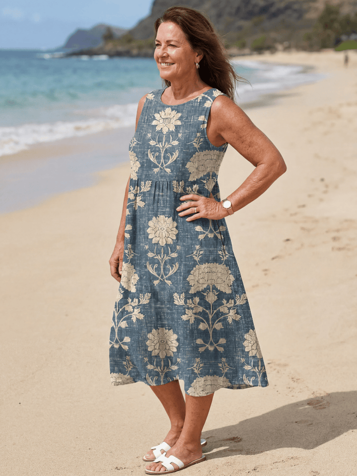 Emma & Rose Cape Town Kailo™ Shoreline Floral Midi Dress featuring a vibrant floral pattern and flowing silhouette.