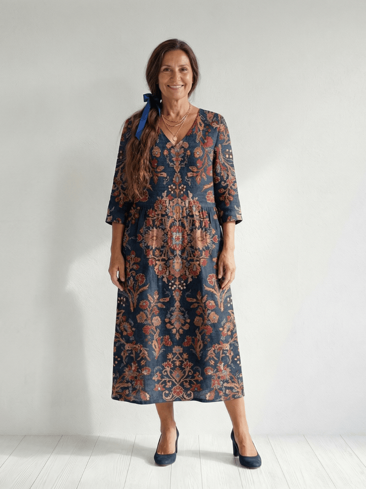 Ivy™ Soft Form Midi Dress by Emma & Rose Cape Town, featuring a flowing fabric and elegant midi length, displayed on a model.
