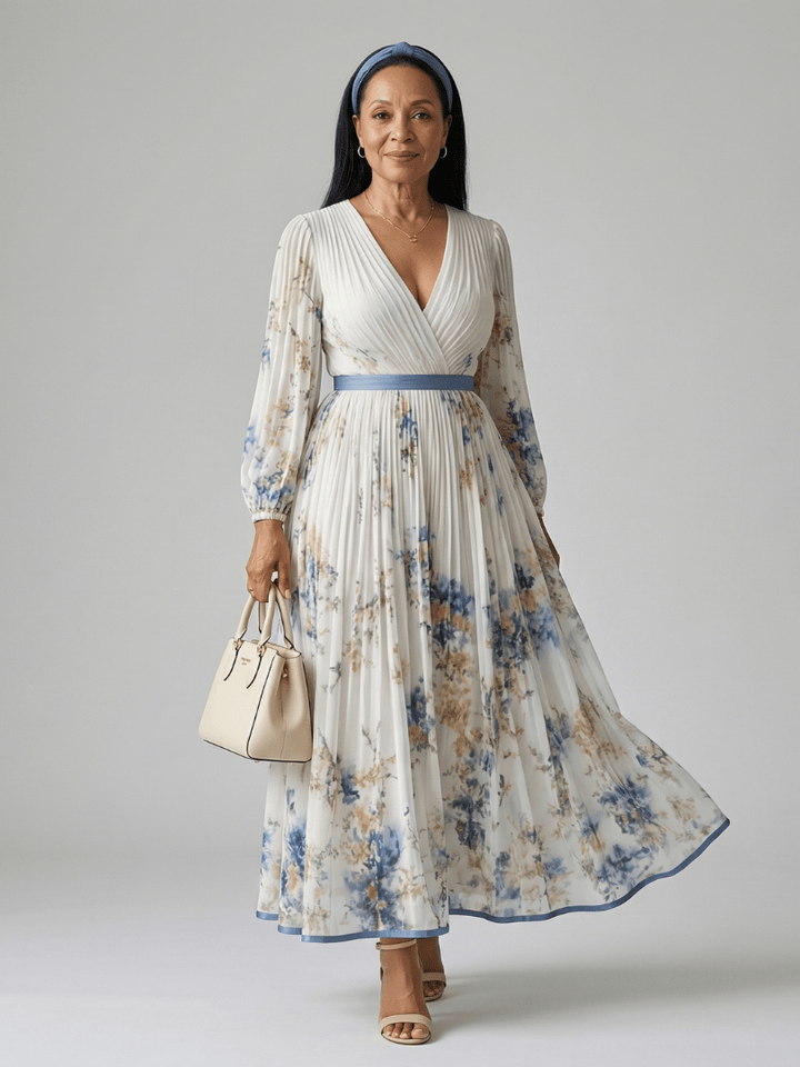 Emma & Rose Cape Town Rielle™ pleated wrap midi dress, featuring a stylish pleated design and elegant wrap silhouette.
