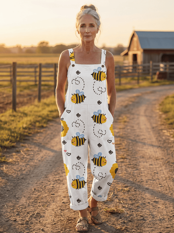 Emma & Rose Cape Town Moxie™ Bee Flower jumpsuit with vibrant floral print, featuring a relaxed fit and adjustable straps.