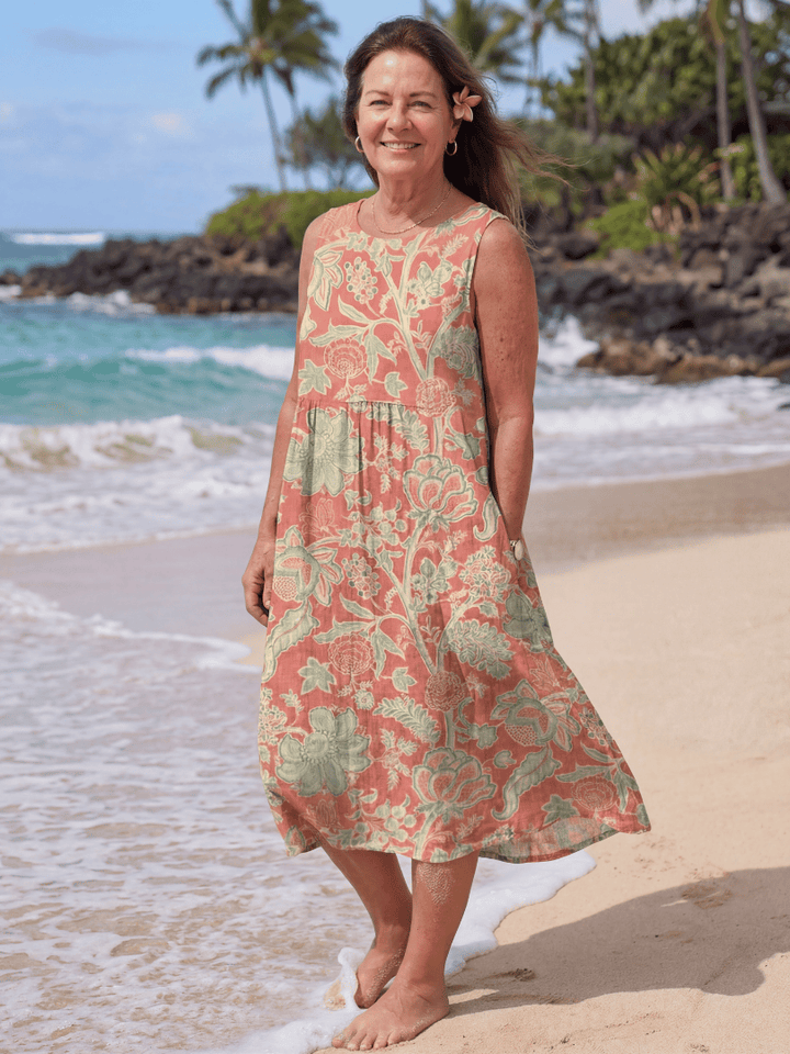 Maui™ Beach Midi Dress by Emma & Rose Cape Town featuring lightweight fabric, floral print, and relaxed fit on a model.