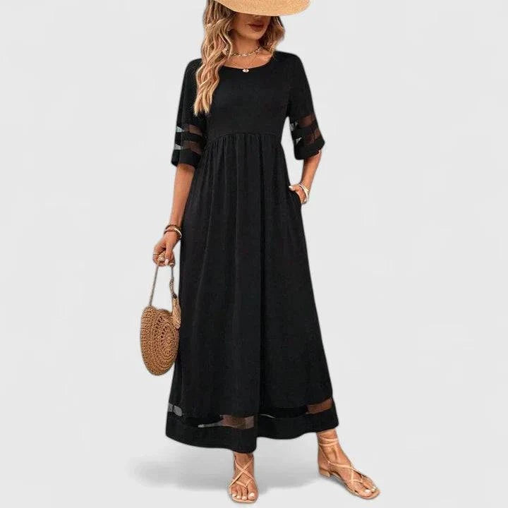 Elegant Delymarina™ midi dress by Emma & Rose Cape Town, featuring a flowing fabric and stylish design, displayed on a hanger.