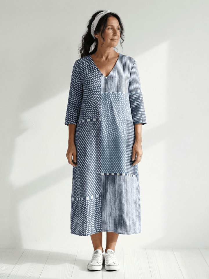 Nolan™ Fit Patchwork Midi Dress by Emma & Rose Cape Town, featuring a stylish patchwork design and midi length, worn by a model.