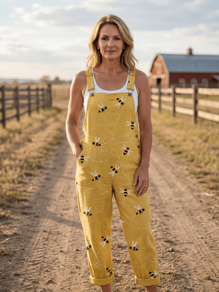 Petra™ Light Honeybee Jumpsuit by Emma & Rose Cape Town, featuring a stylish, lightweight honeybee patterned fabric and relaxed fit.
