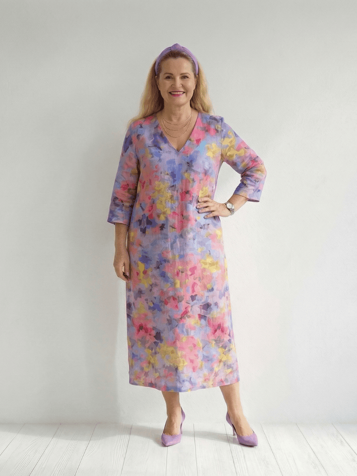 Benson™ abstract floral midi dress by Emma & Rose Cape Town, featuring a colorful floral pattern and flowing midi length.