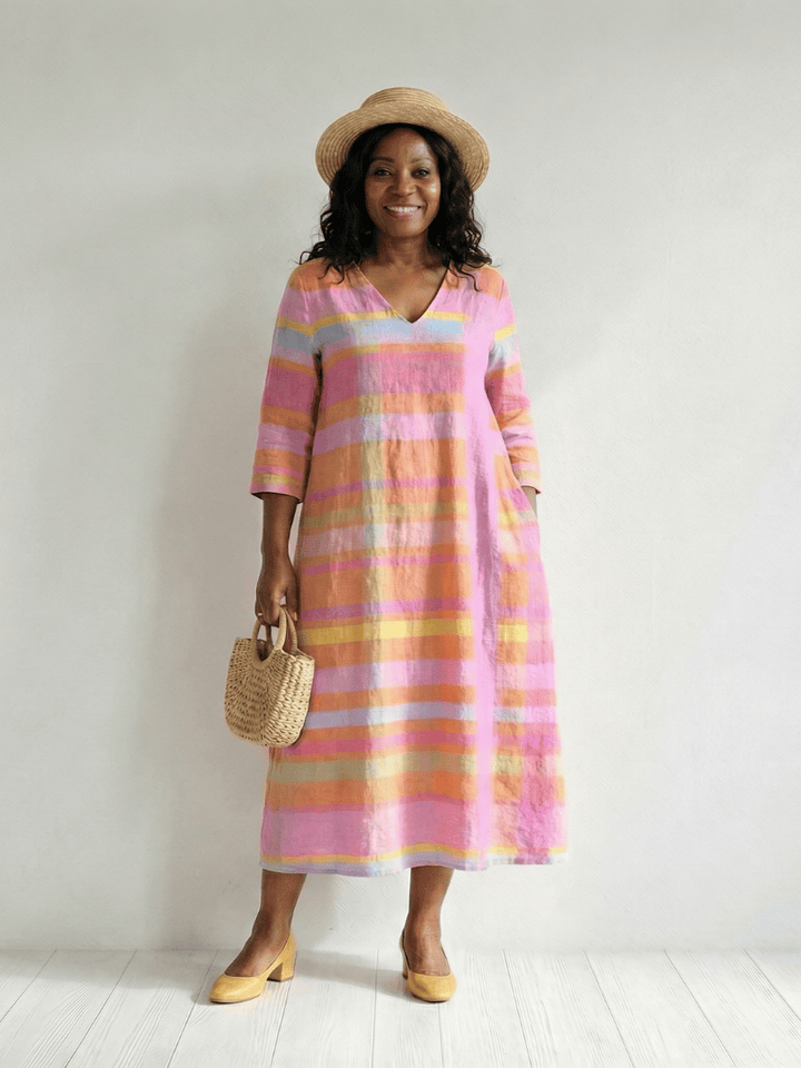 Tessa™ Drape Stripe Midi Dress by Emma & Rose Cape Town featuring a stylish striped pattern and elegant draped design.