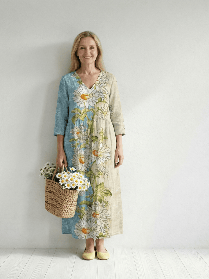Elliot™ Light Daisy Midi Dress by Emma & Rose Cape Town featuring a flowy light fabric and floral daisy pattern.