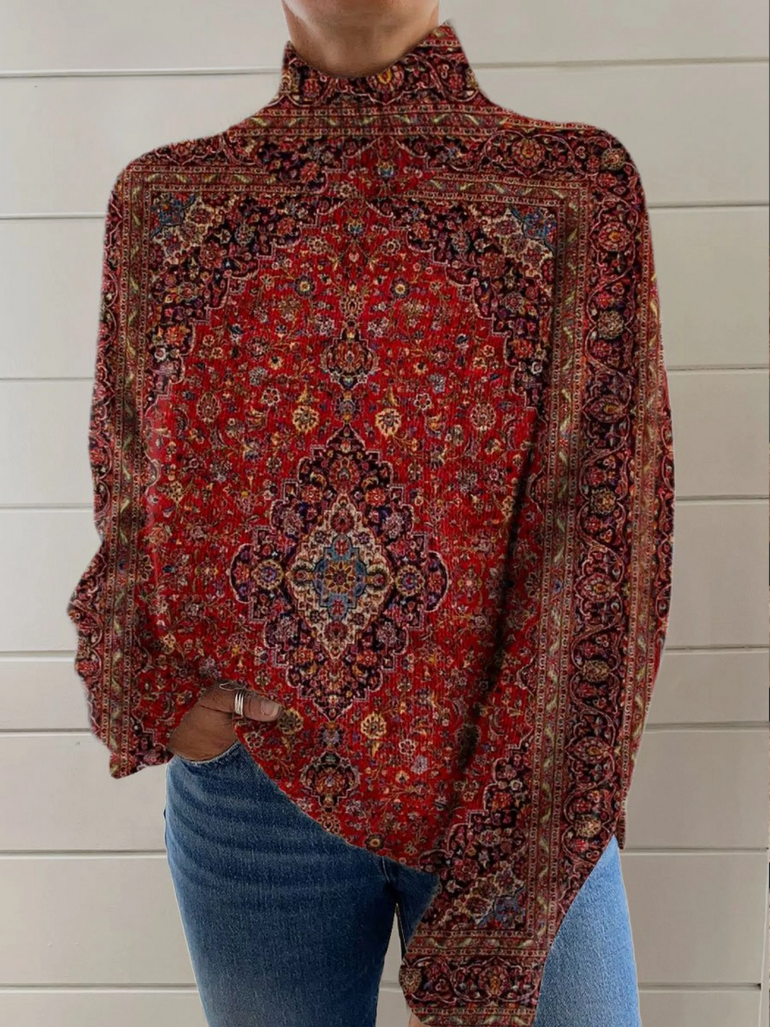 Vintage art print turtleneck pullover by Emma & Rose Cape Town, showing a cozy knit sweater with artistic pattern and classic turtleneck design.