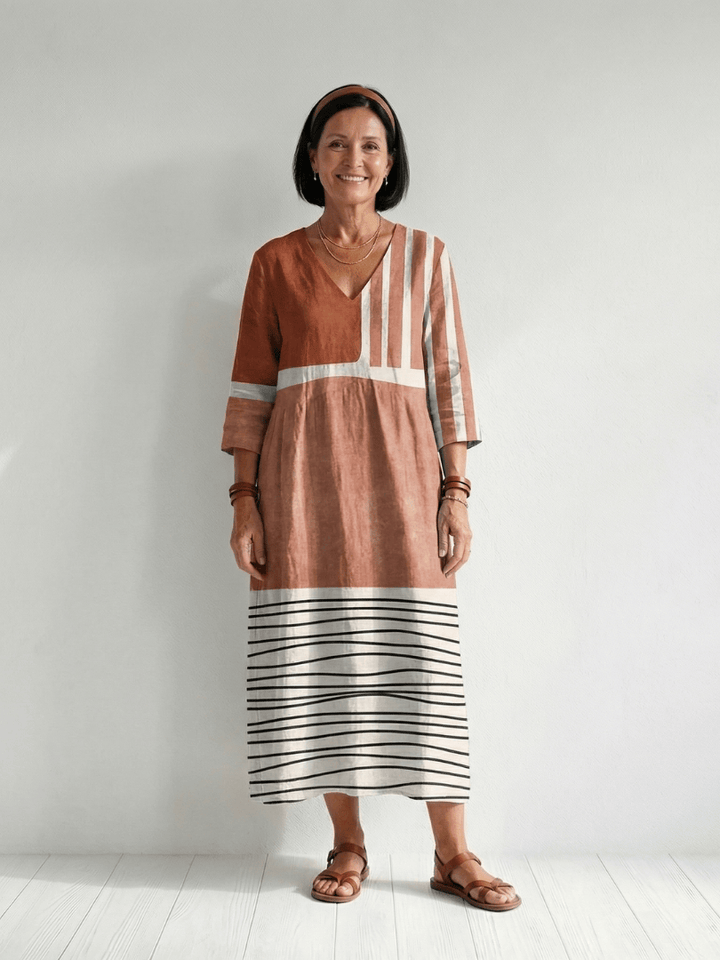 Remy™ Mixed Stripe Midi Dress by Emma & Rose Cape Town, featuring a stylish striped pattern and flowing midi length.