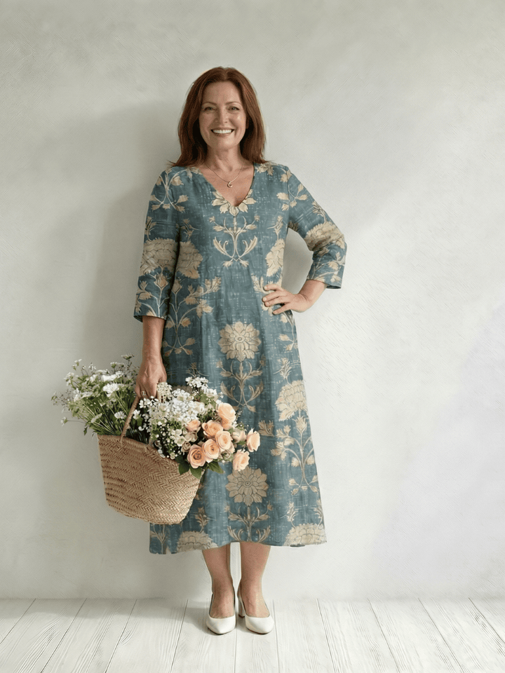 Skye™ Shape Floral Midi Dress by Emma & Rose Cape Town, featuring a feminine floral pattern and midi length fabric.