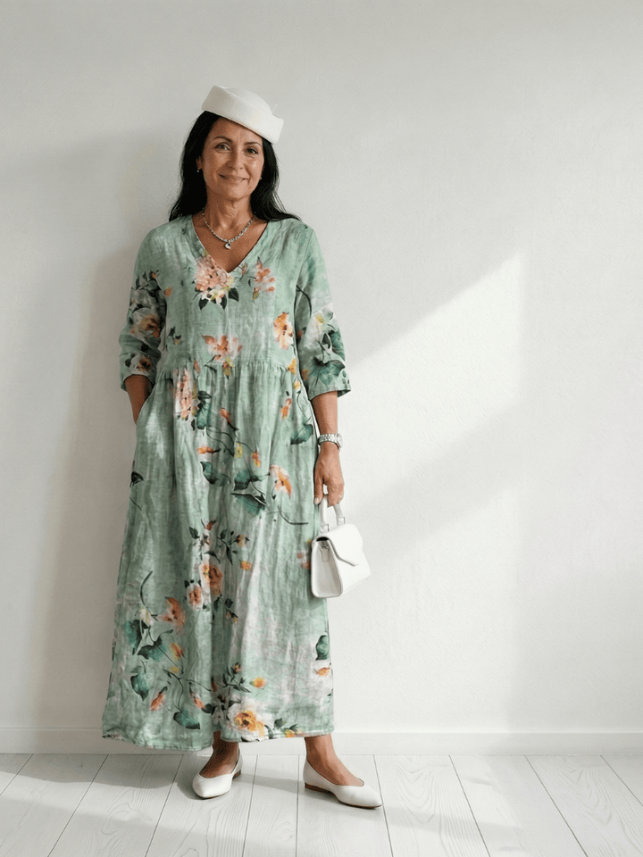 Emma & Rose Cape Town Reid™ Soft Hold Midi Dress in a flowing fabric, shown on a model with a fitted waist and elegant design.