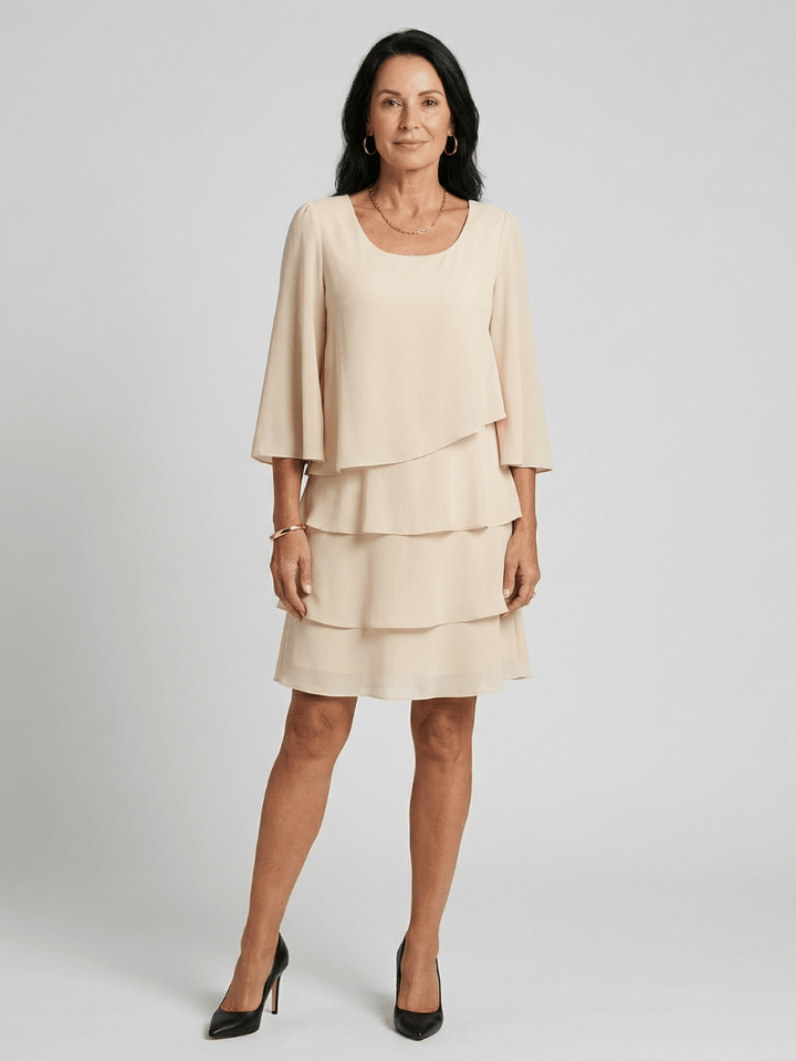 Della™ knee-length sleeve dress by Emma & Rose Cape Town, featuring a fitted silhouette and stylish design.