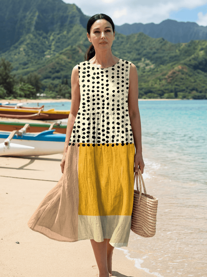 Hugo™ Garden Dot Midi Dress by Emma & Rose Cape Town, featuring a floral pattern and flowing silhouette.