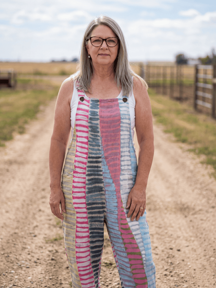 Kaelie™ Stripe Flow Jumpsuit by Emma & Rose Cape Town, showing a stylish, lightweight jumpsuit with vertical stripe pattern and relaxed fit.