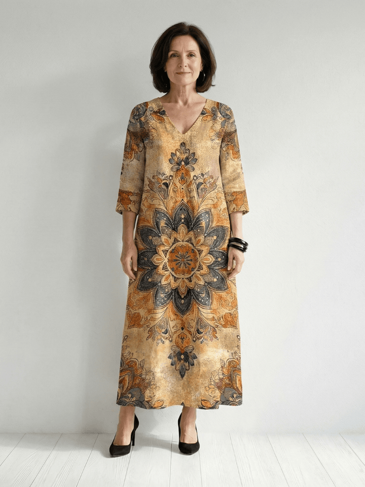 Emma & Rose Cape Town Damon™ gentle floral midi dress with soft fabric and floral pattern, displayed on a hanger.