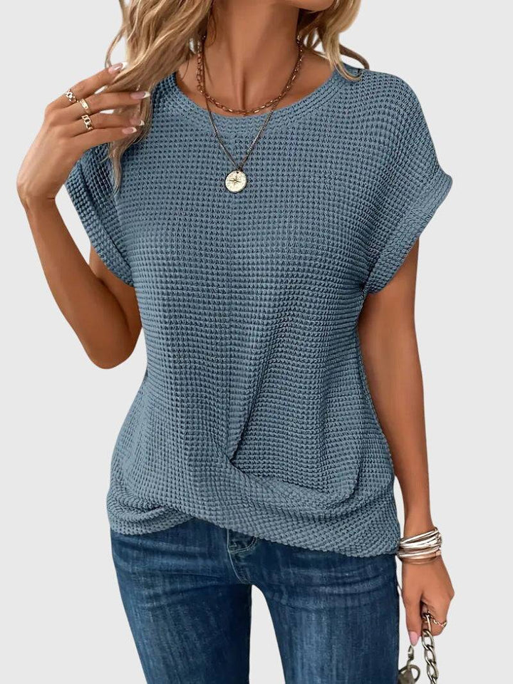 Elegant Emma & Rose Cape Town Isa™ blouse with crew neck, featuring a stylish and sophisticated design.