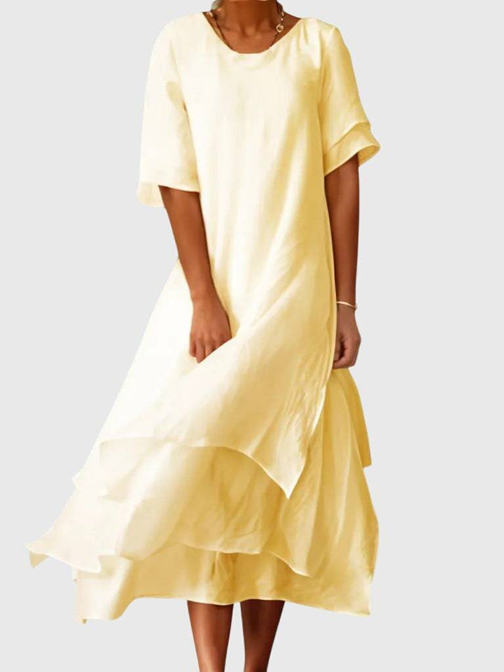Elegant April™ dress by Emma & Rose Cape Town, featuring a stylish design and flowing fabric, perfect for formal occasions.