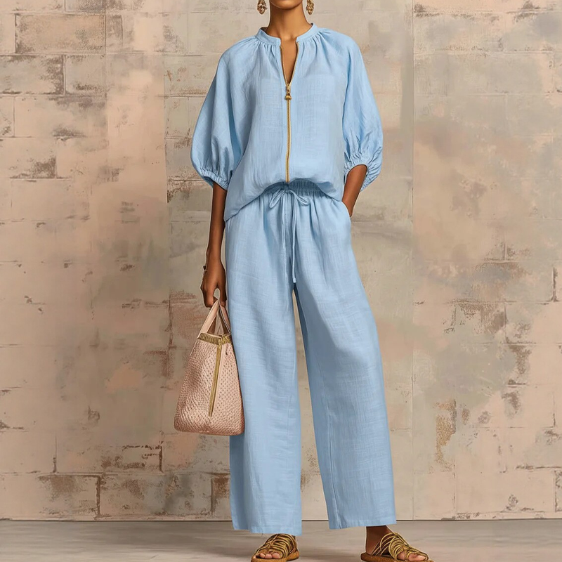 Fluid women's outfit with zip blouse and comfortable wide pants